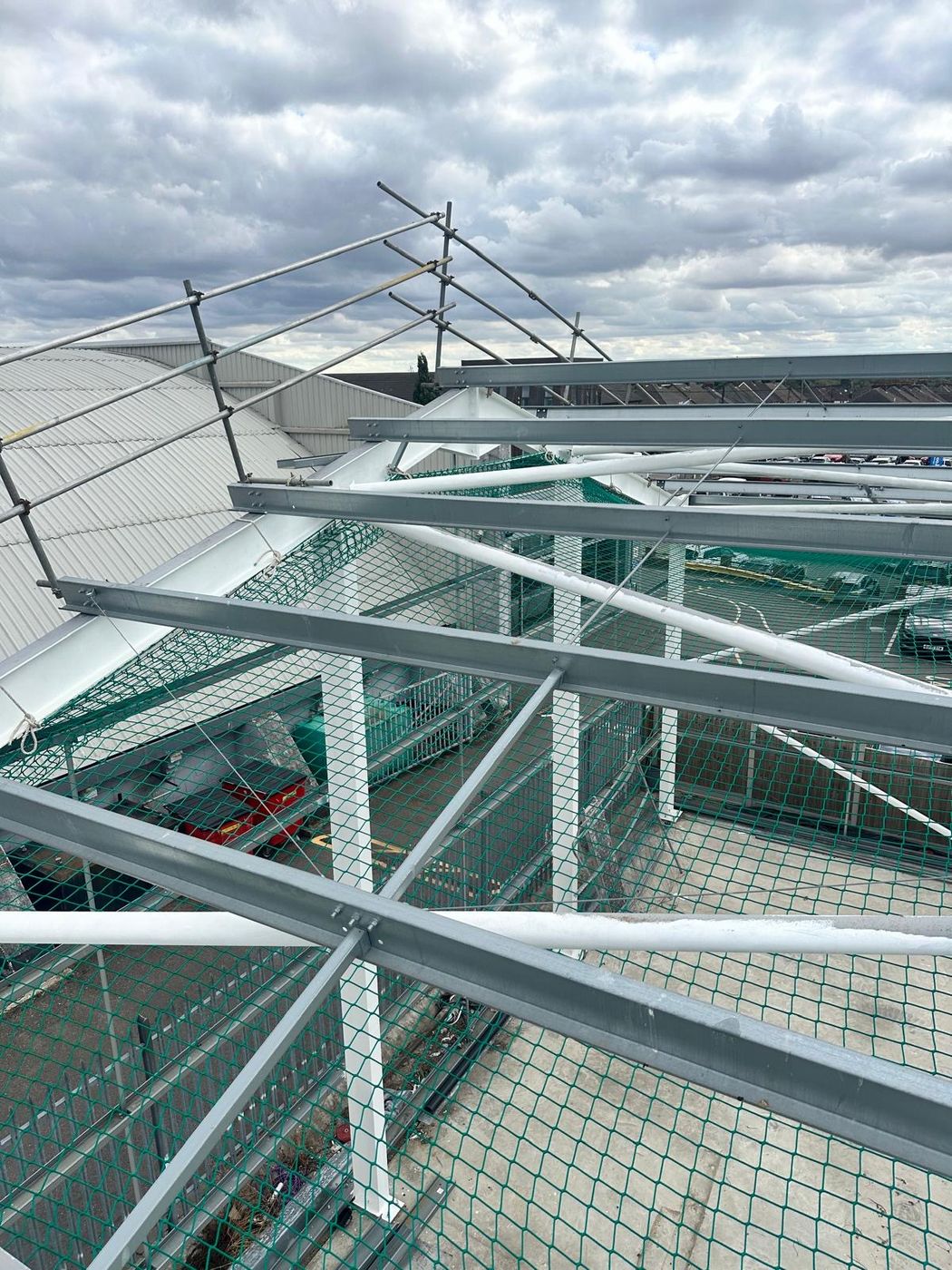 Steel purlins and roof plane of the Springwood Court building during erection