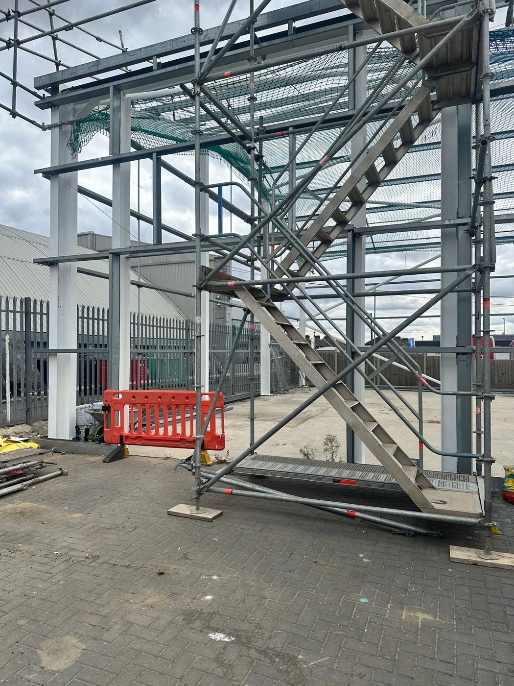 Site access staircase and scaffold at the Springwood Court project